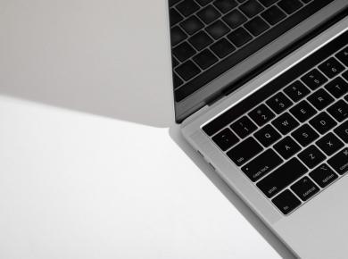 How Do You Become a Data Scientist in 2025 32 Close-up of a sleek laptop keyboard on a minimalist white background, showcasing modern silver design.