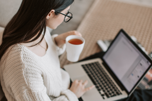 girl researching on laptop about IT certifications