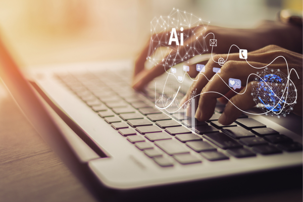 Hands typing on laptop keyboard, AI and technology icons overlay illustrate digital innovation and connectivity.