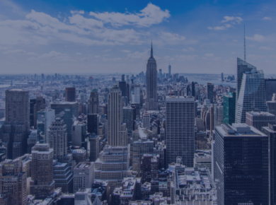 From Basic to Advanced: How to Master English Grammar in the U.S. 44 NYC skyline view with iconic skyscrapers under a clear blue sky.