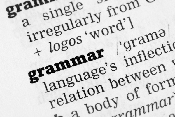 From Basic to Advanced: How to Master English Grammar in the U.S. 6 Close-up of a dictionary definition for the word 'grammar,' representing the essential linguistic foundations needed to master English grammar.