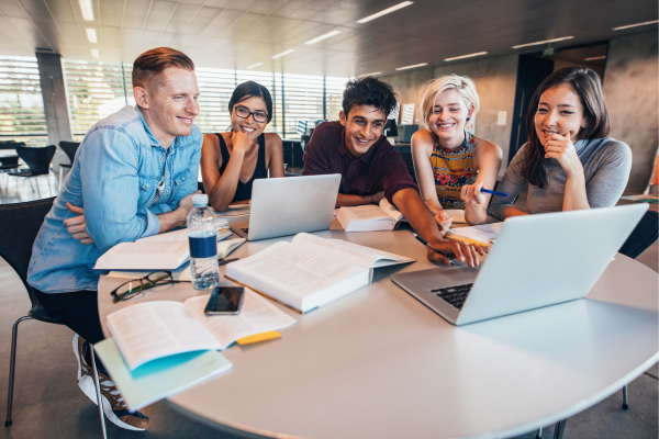How University Innovation Centers Drive Student Entrepreneurship 6 University students collaborating on a project, innovation-driven teamwork in a modern learning environment