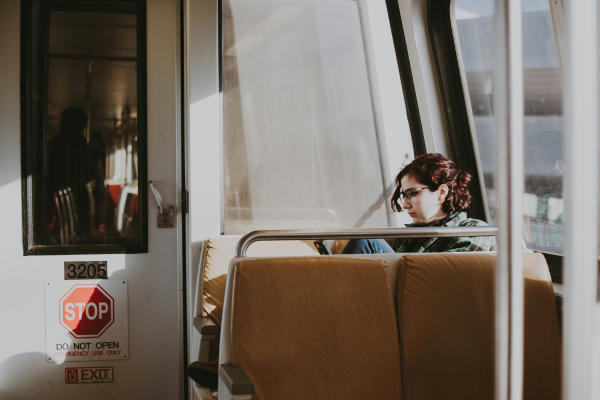 Why Studying in Your Hometown is the Smartest Financial Move in 2026 11 Student commuting to university by public transport, showing how studying in your hometown can reduce living costs