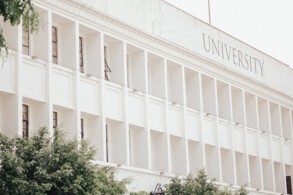 How Career-Focused Universities Help Reduce Student Debt and Improve Career Outcomes 6 White university building providing a visual for career-focused universities