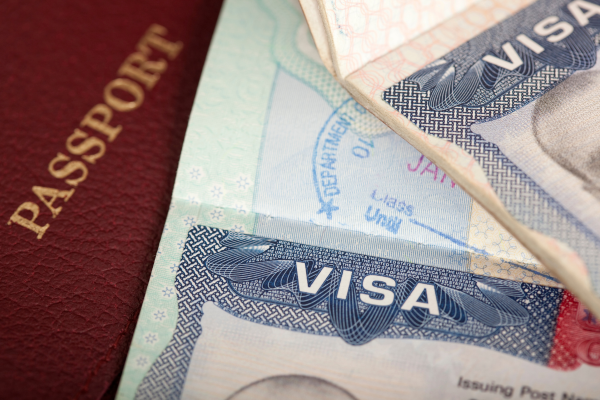 New F-1 Visa Rules for International Students: Your Questions Answered 6 Passport and U.S. visa illustrating the new F-1 visa rules for international students
