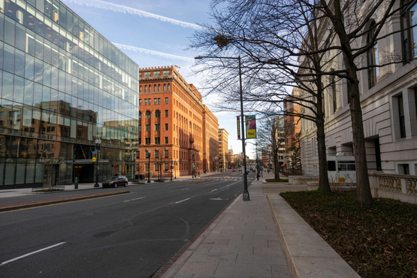 The Future of Business Development: How AI Is Changing the D.C. Market 7 Washington, D.C. street lined with historic and modern office buildings.