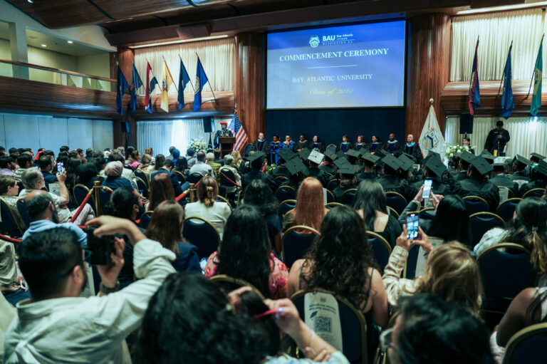 Graduation ceremony at Bay Atlantic University with students and families in attendance, Class of 2023.