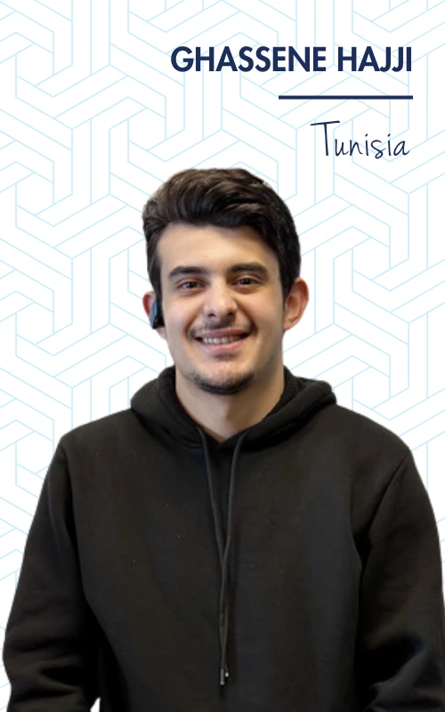 Young man in a black hoodie smiling against a geometric background with Tunisia text above.