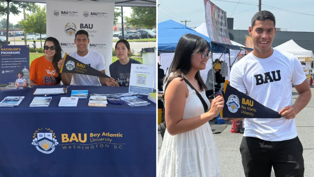 BAU booth at an outdoor event promoting Bay Atlantic University with brochures and pennants.