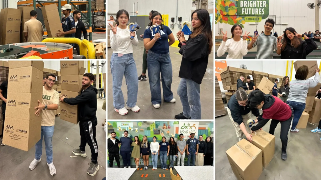 Volunteers packing and organizing boxes at a food bank for a community event.